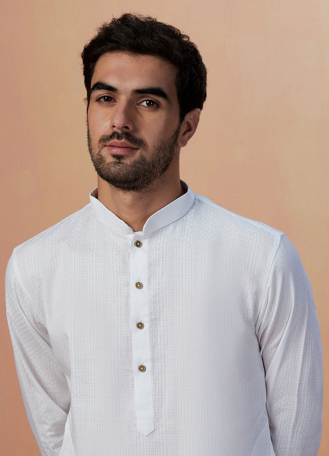 alt message - Manyavar Men White Self Striped Kurta Pajama image number 0